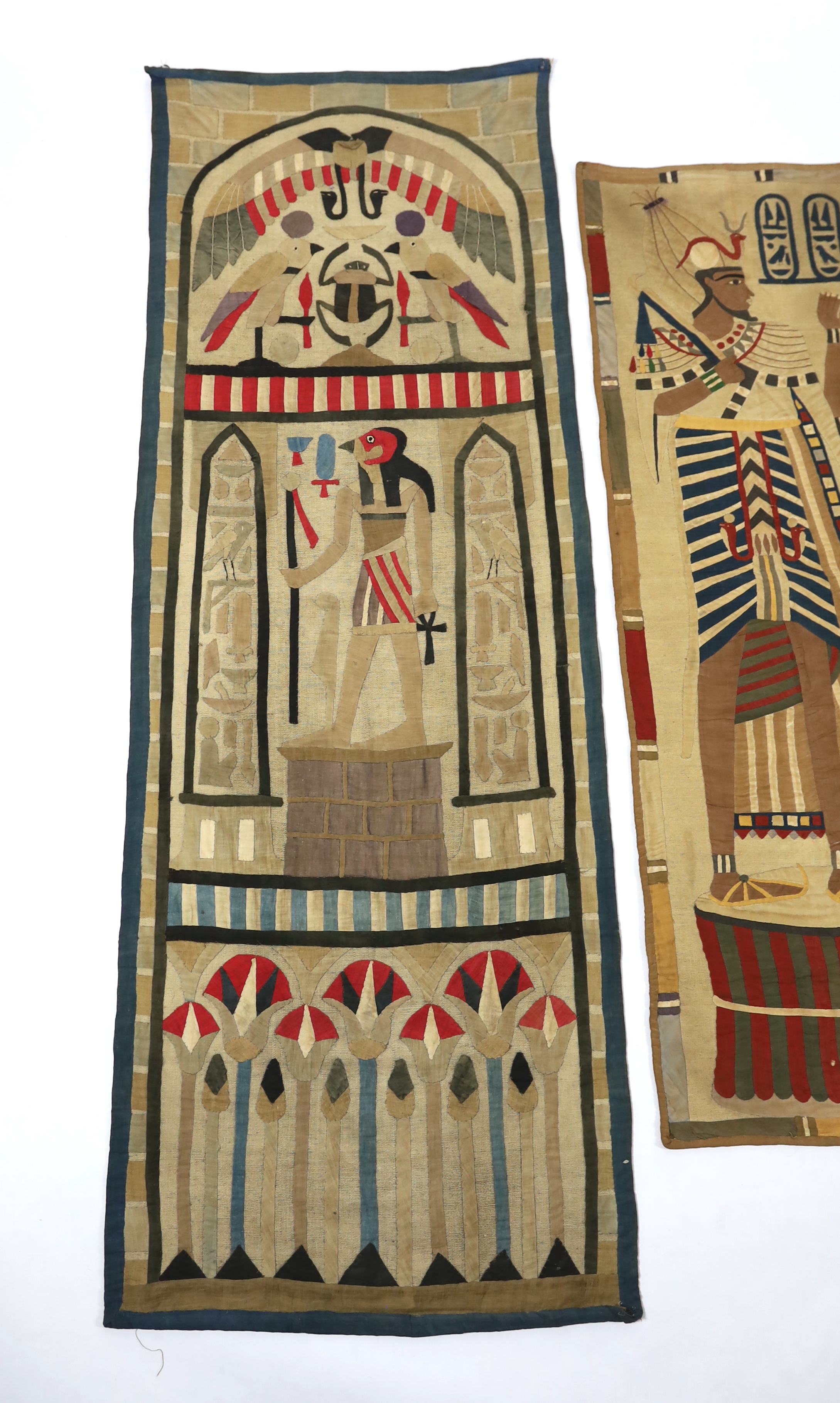 Four 1930’s Egyptian appliqué wall panels, (a pair and two single panels), decorated with various hieroglyphs, Gods and Pharaohs, the panels made for the European market experiencing an Egyptian revival after the discove